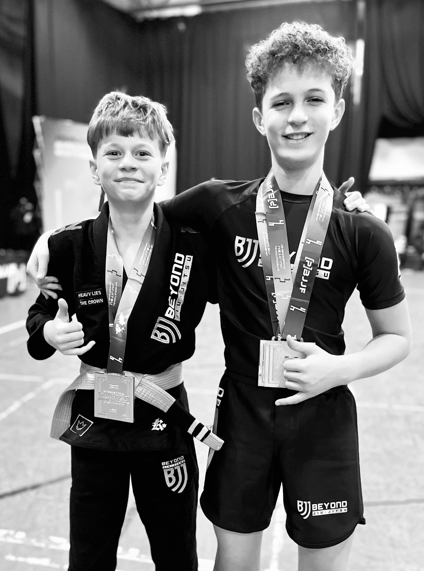 Teen BJJ champions with medals at competition