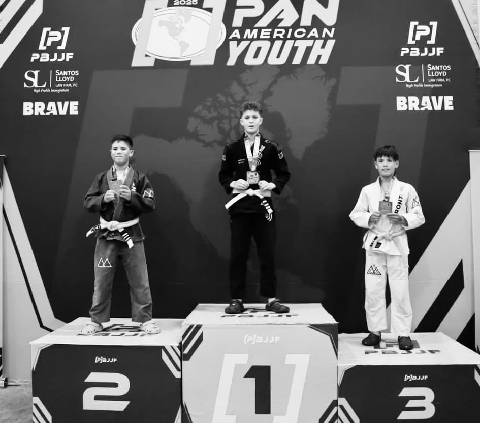 Teen BJJ athlete on podium at Pan-American Youth Championship